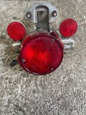 1975 RD125 tail light rear brake light and mount assembly OEM picture