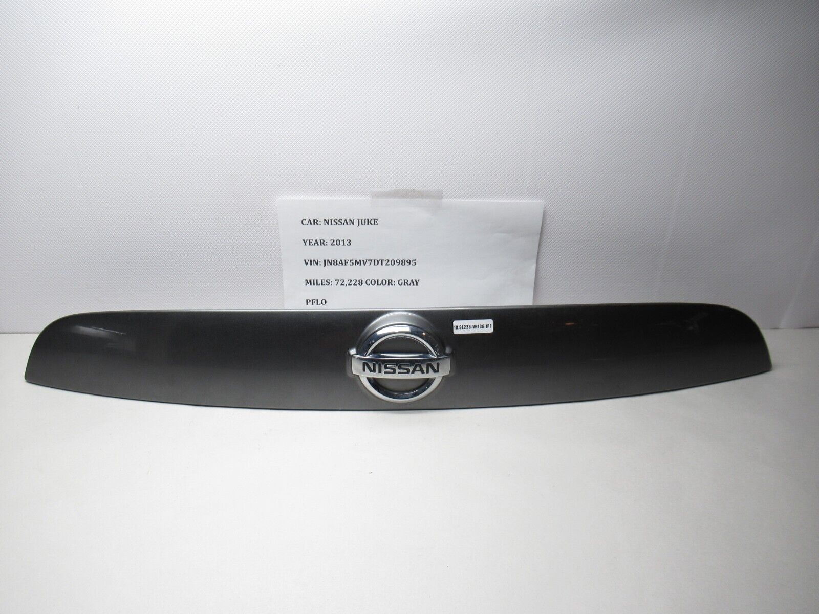 11-14 Nissan Juke Rear Liftgate Tailgate License Molding Plate 90810-1KR0A OEM